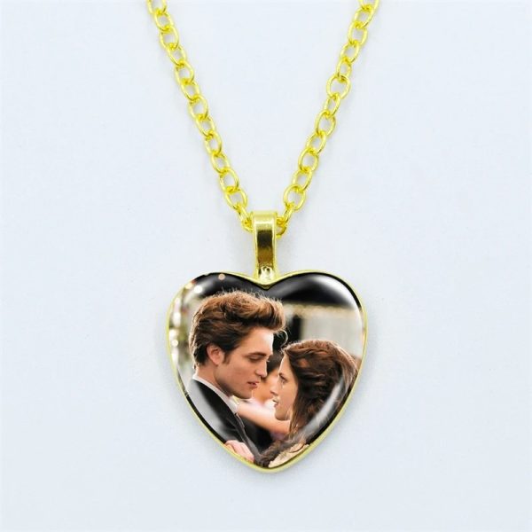 Twilight movie vampire necklace with glass heart pendant featuring Bella and Edward
