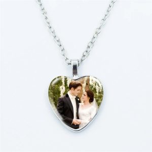 Twilight movie vampire necklace with glass heart pendant featuring Bella and Edward