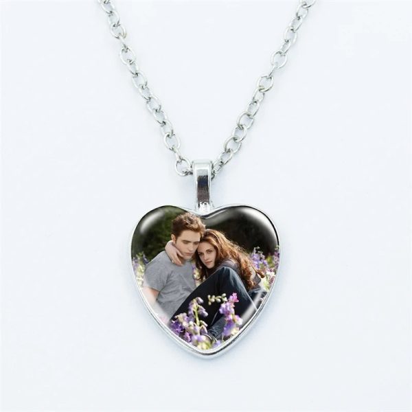 Twilight movie vampire necklace with glass heart pendant featuring Bella and Edward